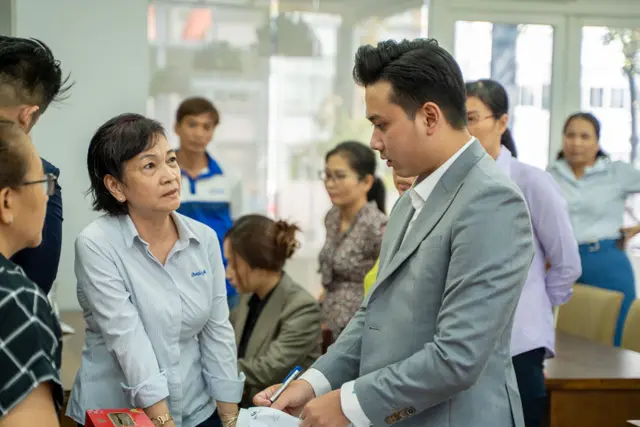 Mon Amie may đồng phục cho Công ty Dịch vụ Công ích Quận 4 — 4/10
